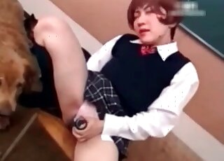 Asian slut is busy toying her pussy with a dildo in front of her dog