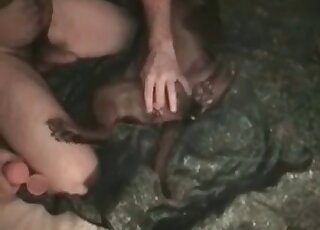 Nasty pervert bangs a hole of submissive animal in a beastiality vid