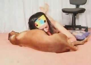 Cock-starved mature stuffs her filthy mouth with her canine’s dong